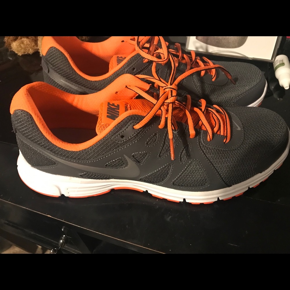 Men’s size 13 Nike Revolution 2 tennis shoes.